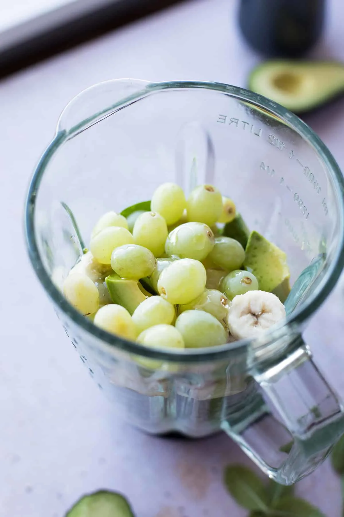 The unblended ingredients in a blender seen from the top.