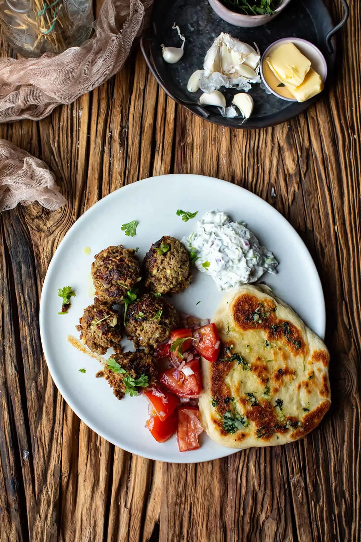 Serving suggestion with Indian kebabs and raita.