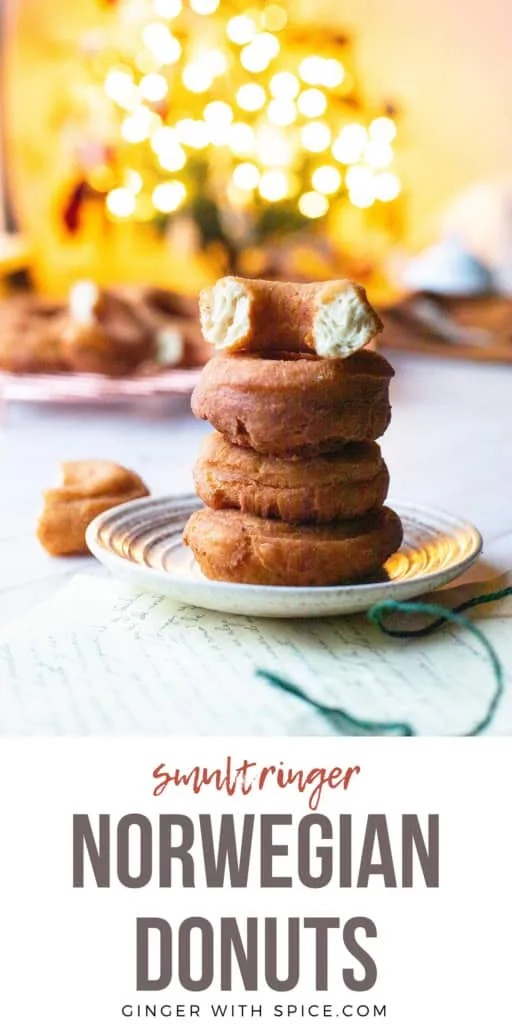 Stack of three donuts with one half cut open on the top to show the insides. Pinterest pin.