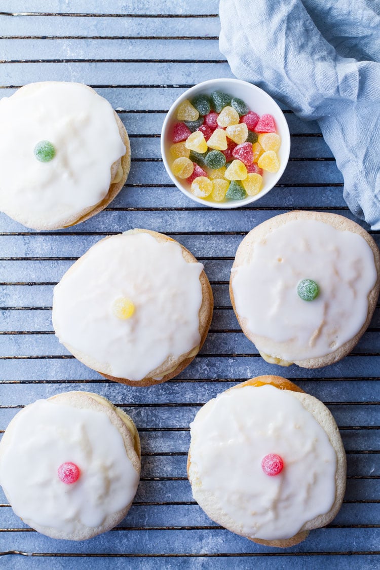 Soft cakes decorated with the traditional jelly candy. Flatlay.