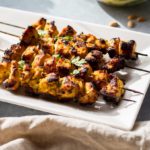 Curry Coconut Chicken Satay with Mango Cucumber Salad