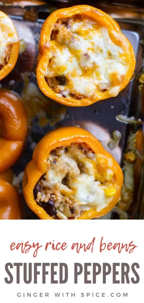 Stuffed orange bell peppers with rice and beans and melted cheese. Closeup. Pinterest pin.