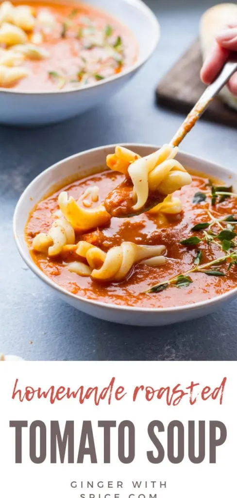 Spoon spooning up pasta from roasted tomato soup. Pinterest pin.