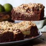 Focus on one slice of chocolate pear cake, with the whole cake in the background.