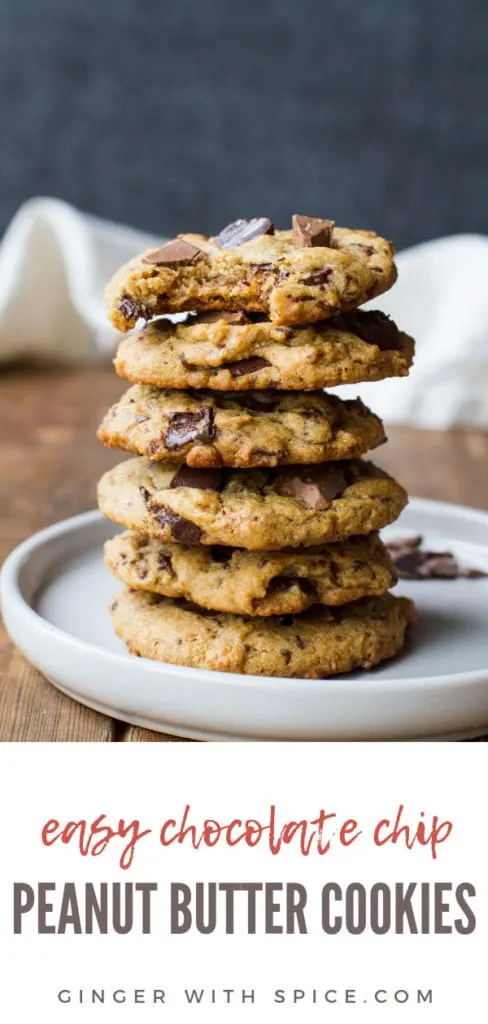 Stack of chocolate chip cookies on a white plate, one taken a bit out of. Pinterest pin.