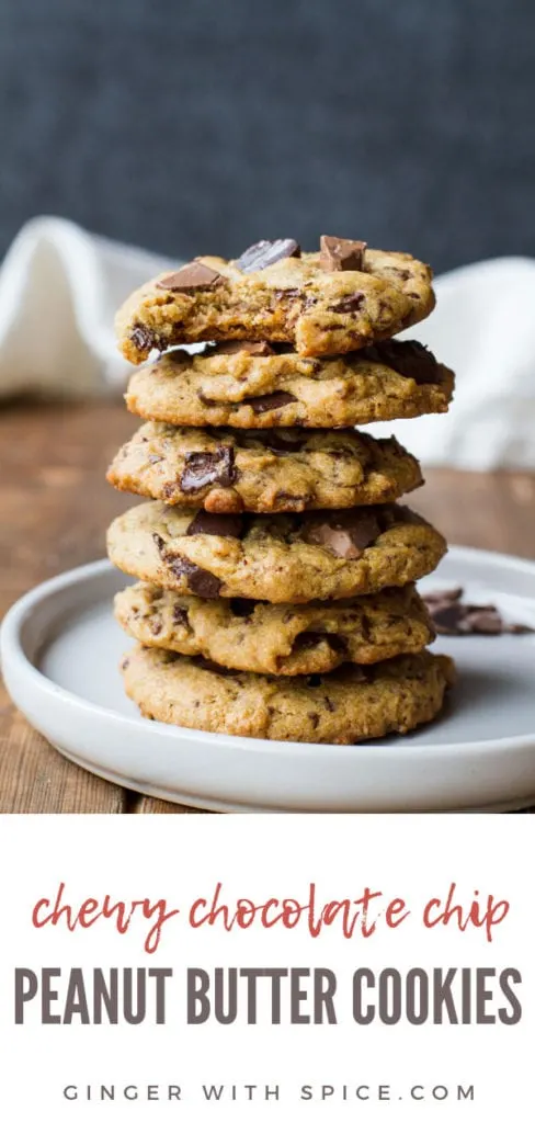 Stack of peanut butter chocolate chip cookies on a white plate, one taken a bit out of. Pinterest pin.