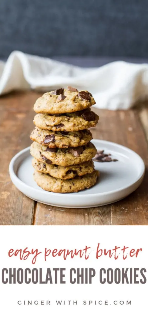 Stack of peanut butter chocolate chip cookies on a white plate. Wooden background. Pinterest pin.