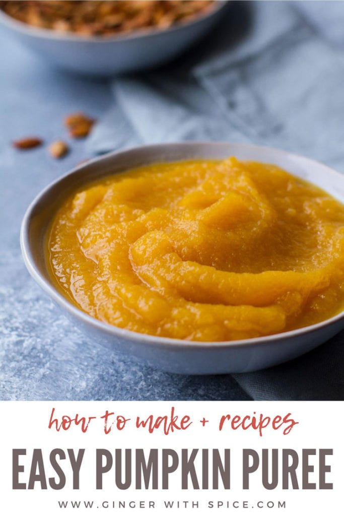 Pumpkin puree in a blue bowl, blue background. Roasted pumpkin seeds in the background. Pinterest pin.