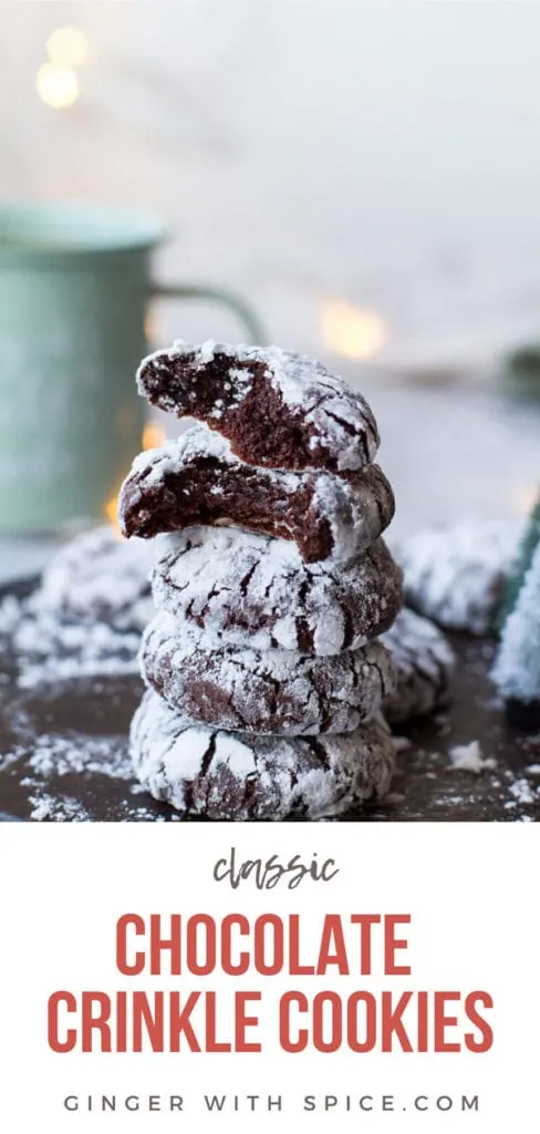 A stack of chocolate crinkle cookies, two top cookies are torn in two. Pinterest pin.