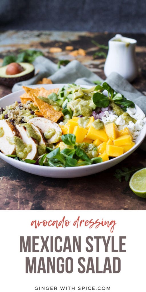 Big white bowl with ingredients like diced mango, sliced chicken, tortila chips and avocado slices. Pinterest pin.