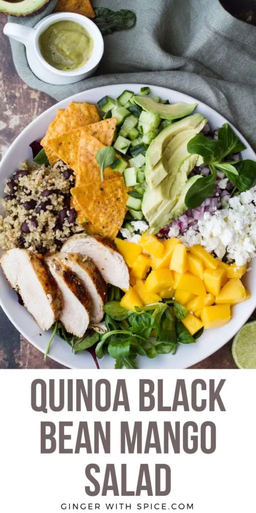 A white bowl with mango, feta cheese, avocado slices, rice and beans and chicken. Pinterest pin.
