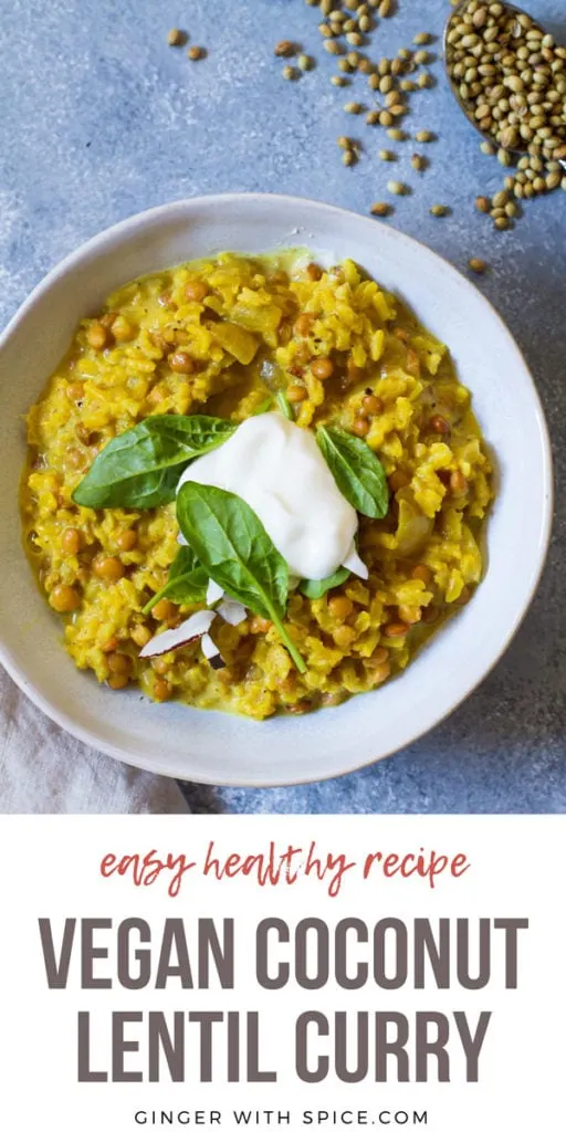 A rustic bowl with lentils curry and yoghurt, blue background. Pinterest pin.