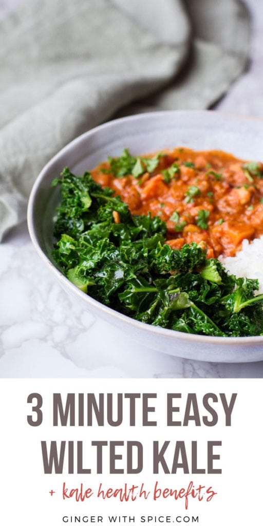 Blue bowl with stew and garlic butter wilted kale in focus. Pinterest pin.