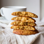 A stack of cut opened banana snickerdoodle cookies.