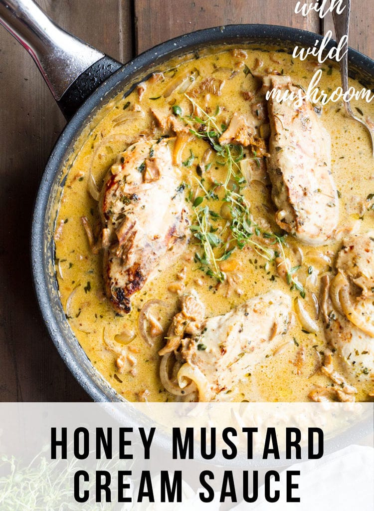 Four chicken breast in mustard cream sauce, garnished with thyme. Flat-lay. Pinterest pin.