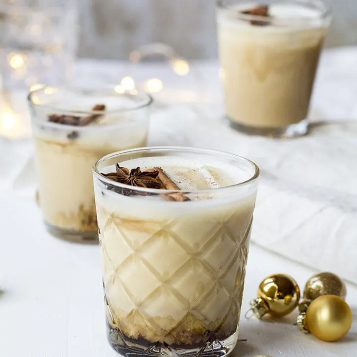 Three white russians, with golden ornaments around.