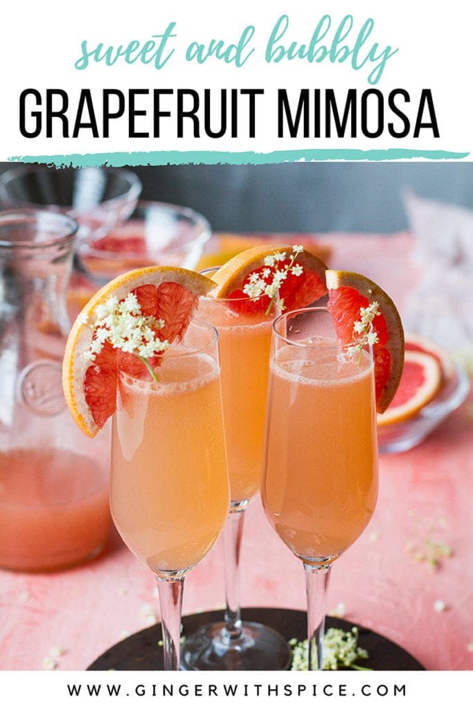 Three champagne flutes with grapefruit mimosa and text overlay at the top. Pinterest pin.