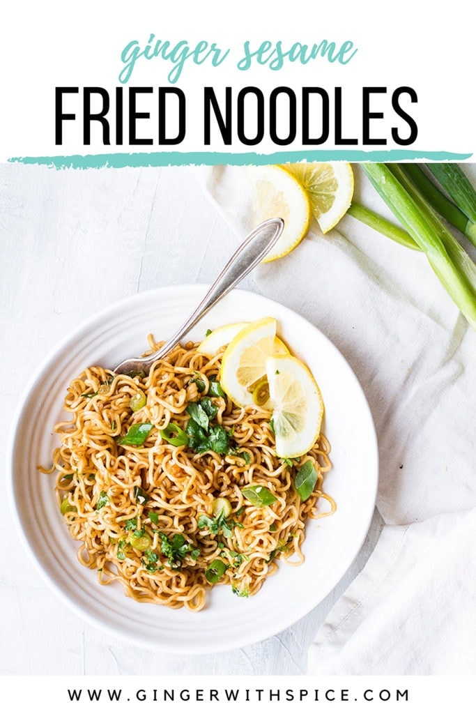 White bowl with fried noodles and green onion. Flatlay and Pinterest pin with text at the top.