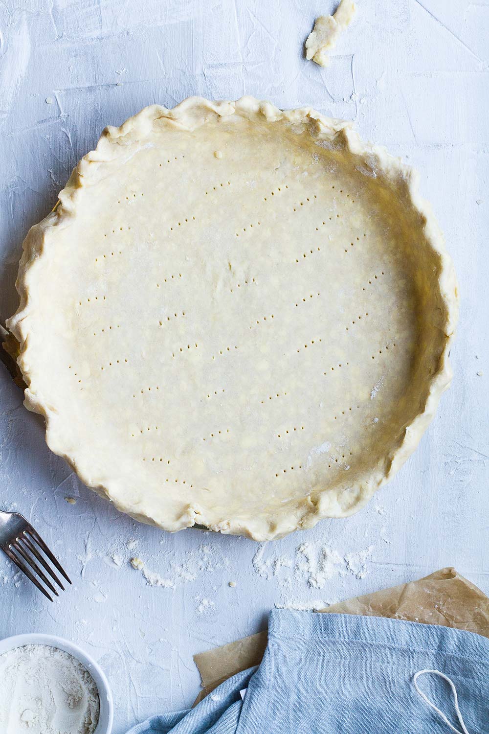 Pie pan filled with an unbaked pie crust.