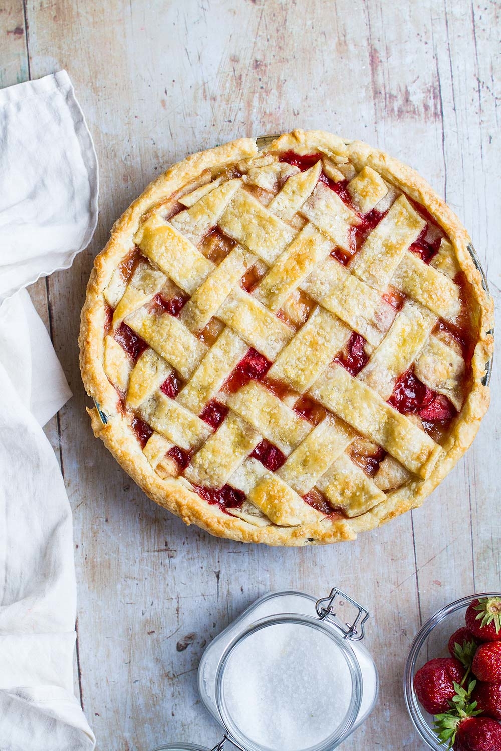 Strawberry peach pie seen from above.