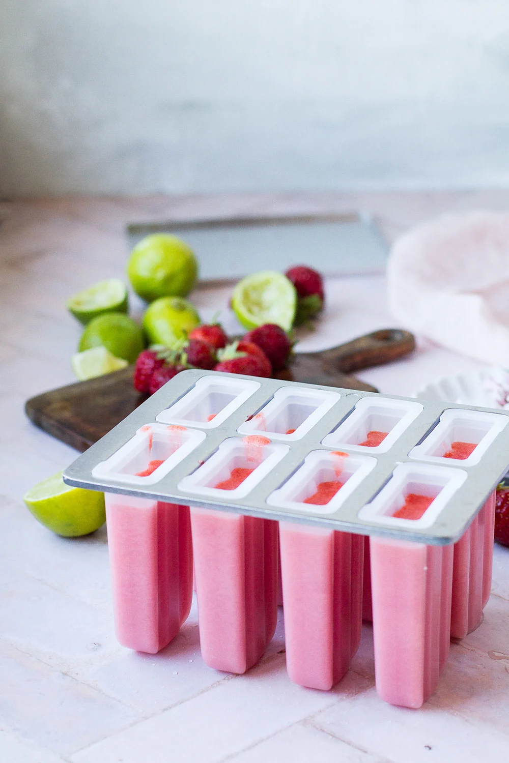 Ice cream tray with pink strawberry filling.