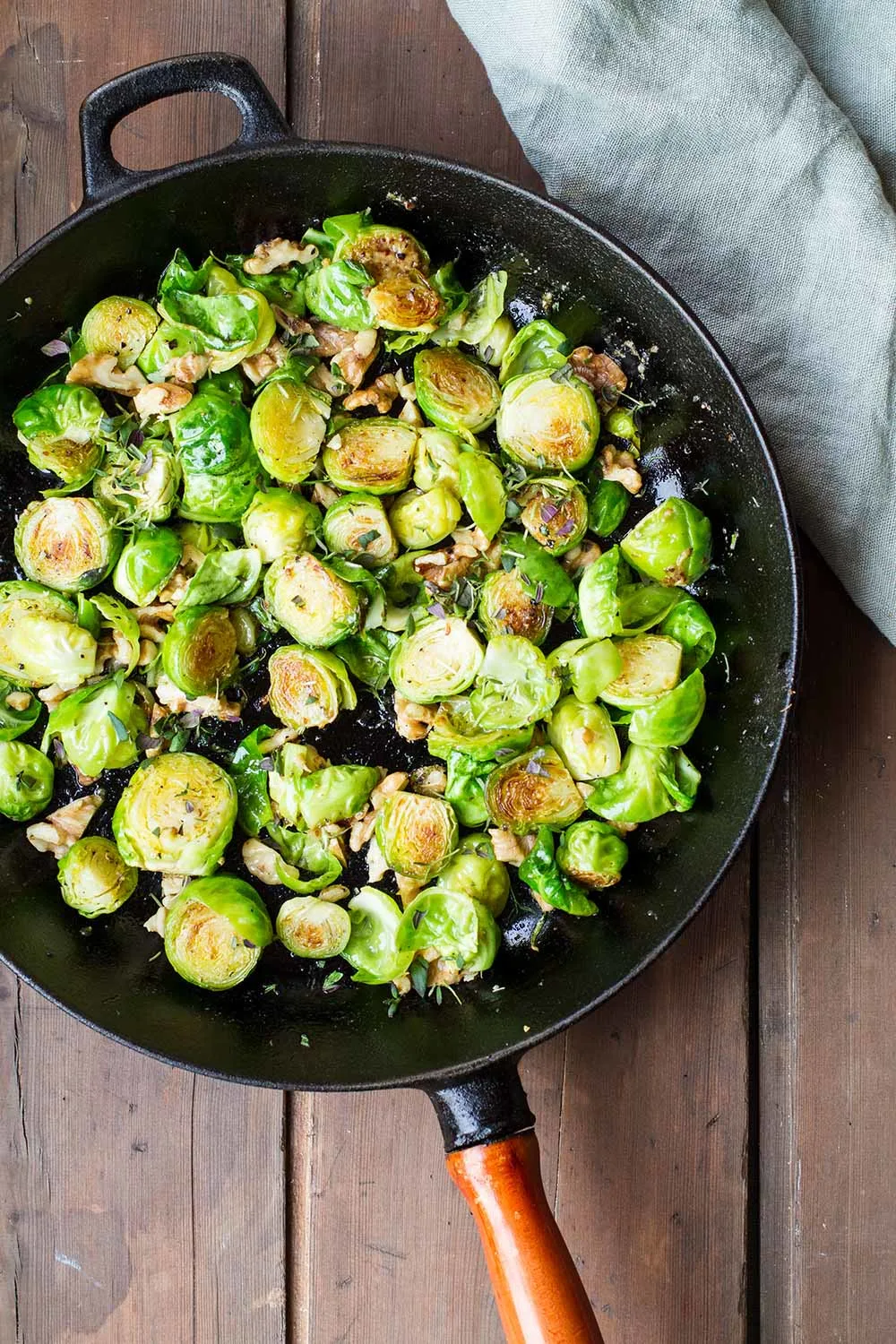 Brussels sprouts in a cast iron skillet.