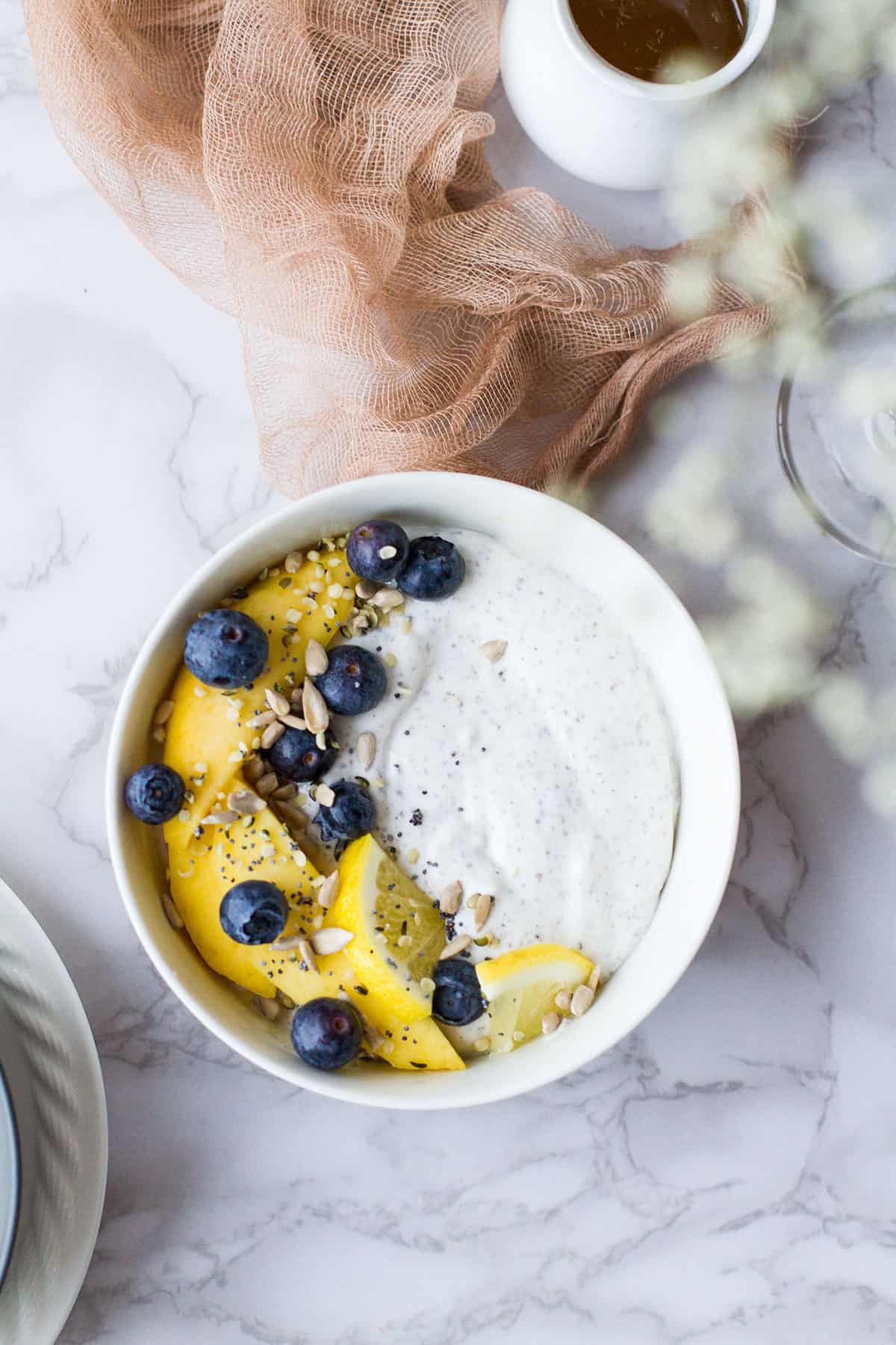 Protein chia yogurt topped with mango and blueberries.