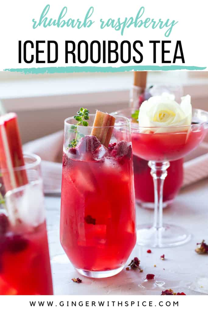 Glasses with red tea and frozen raspberries, text at the top, Pinterest pin.