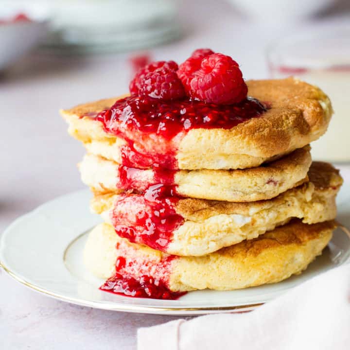 Close-up of Japanese pancakes and raspberry sauce.