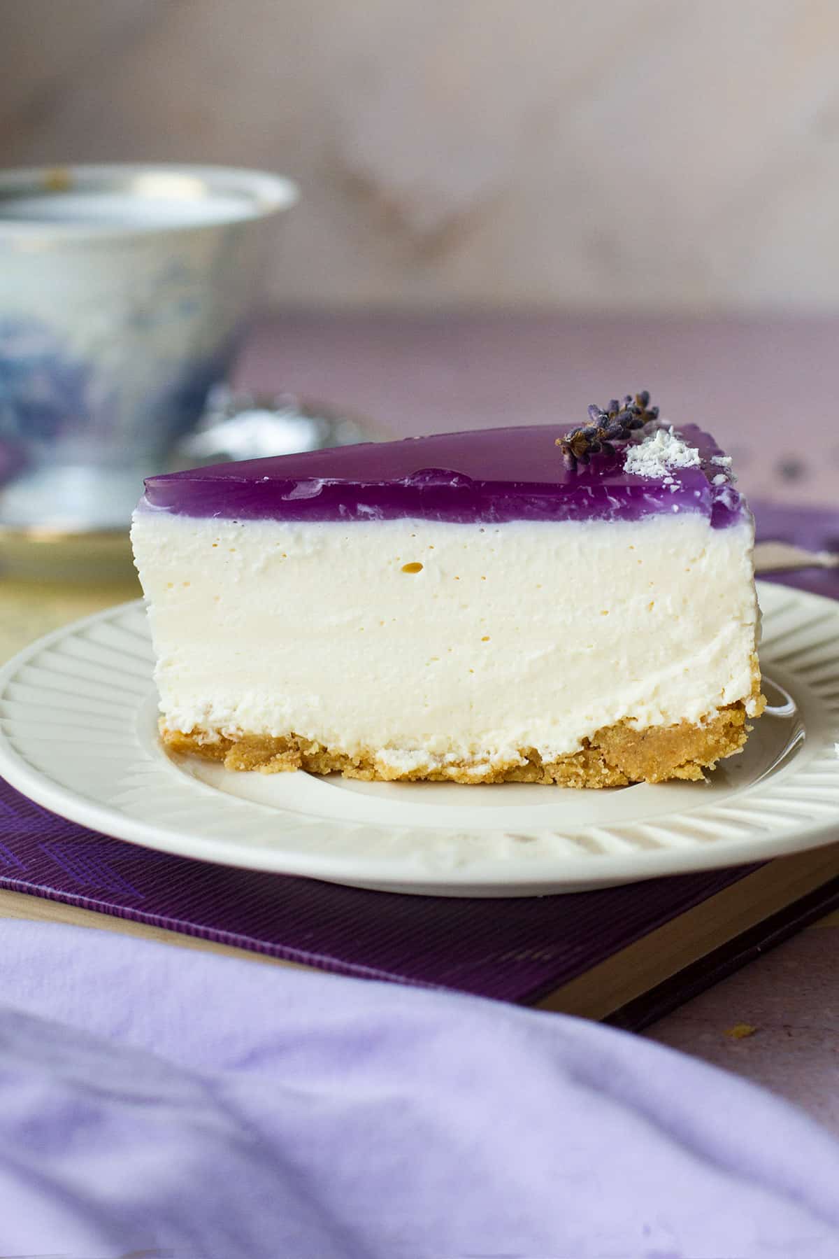 A slice of cheesecake seen from the side.