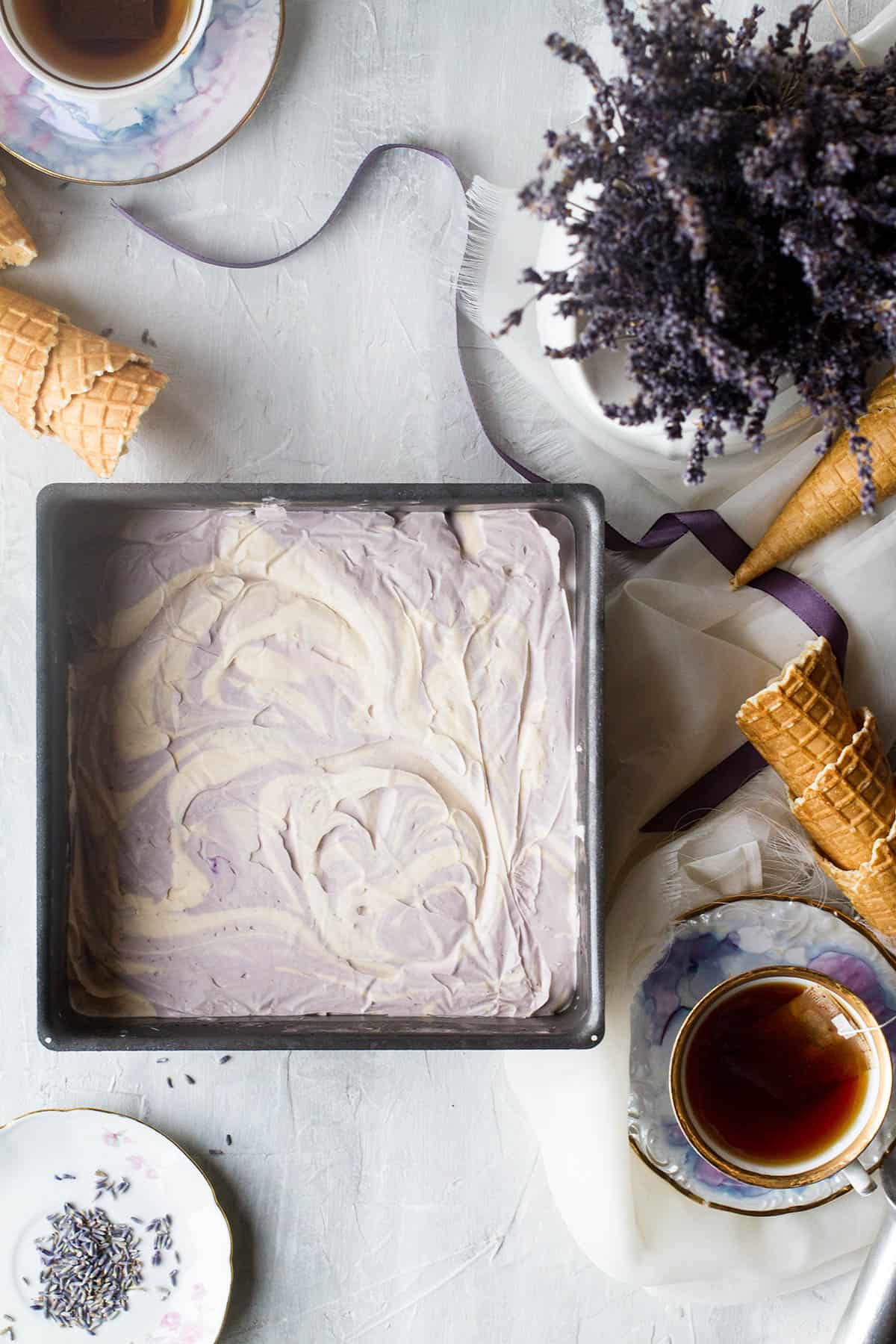 An 8x8 inch baking pan with ice cream.