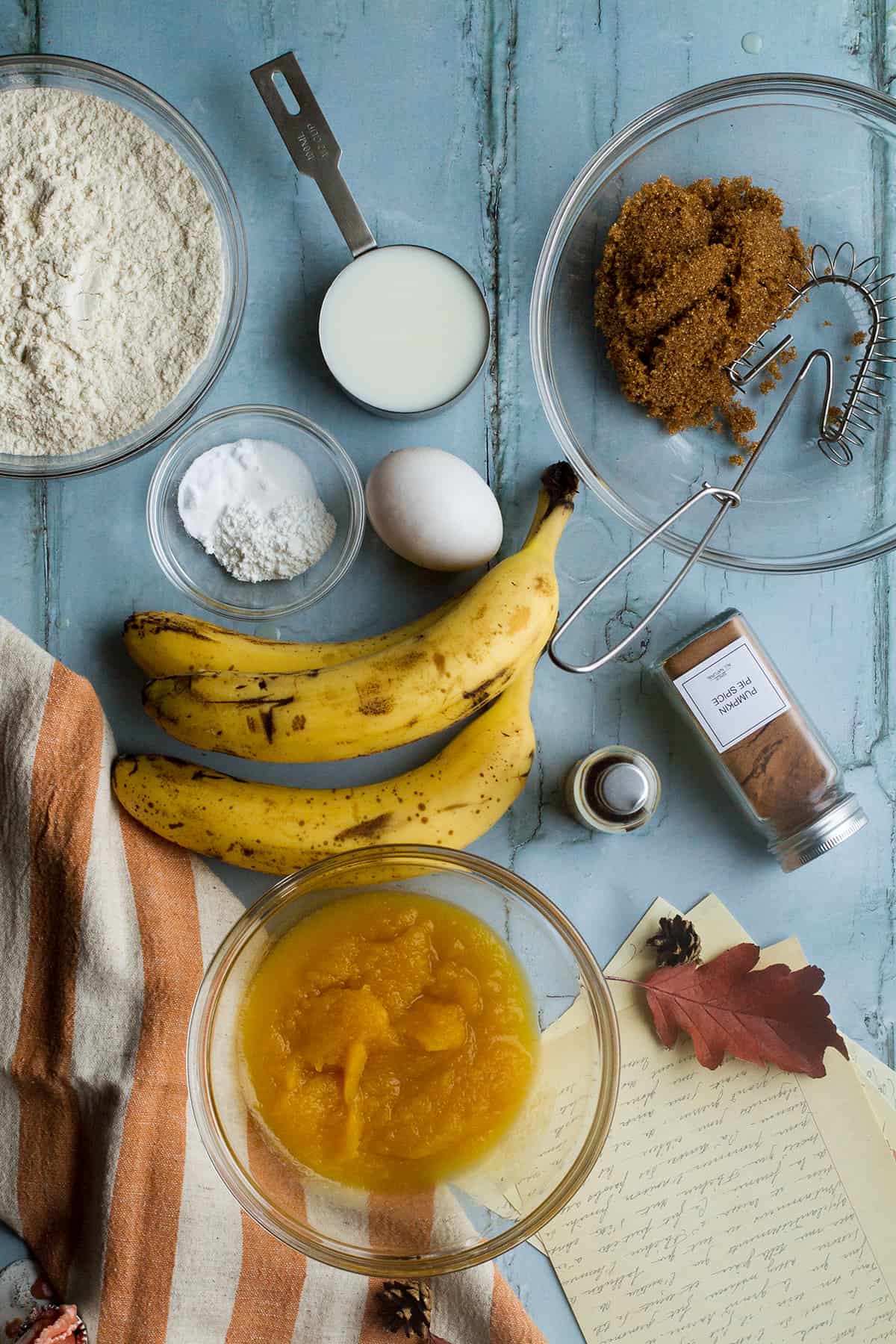 Ingredients to make pumpkin banana muffins.