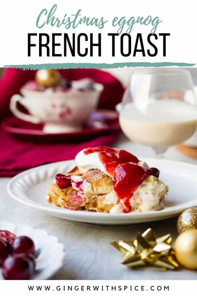 Pinterest pin with an image of a slice french toast casserole with strawberry sauce on top.