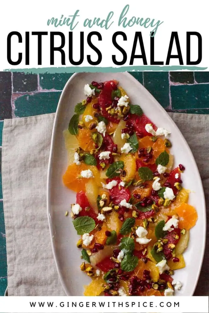 Mint citrus salad seen from above. Pinterest pin with text at the top.