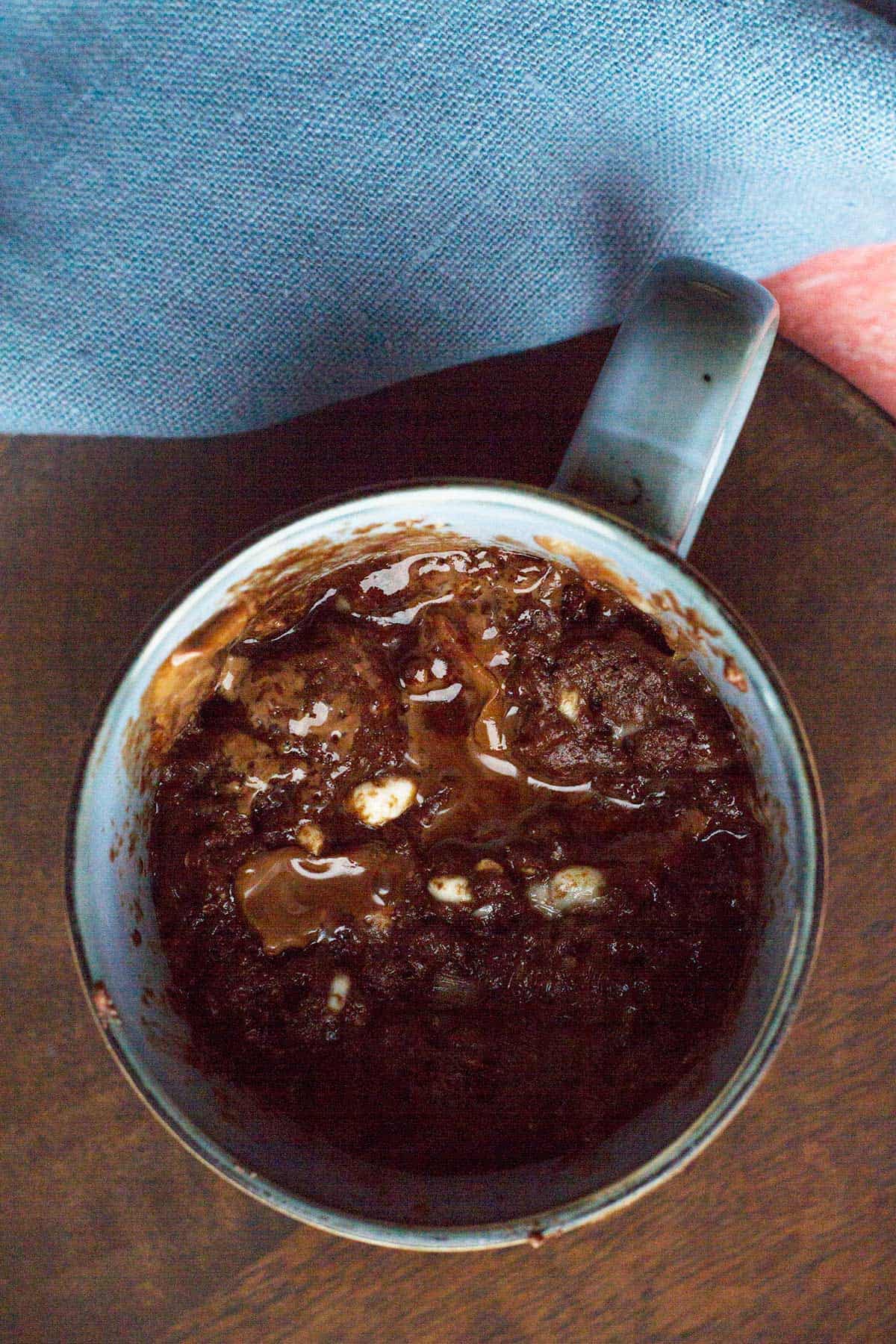 Chocolate protein mug cake as seen from above.