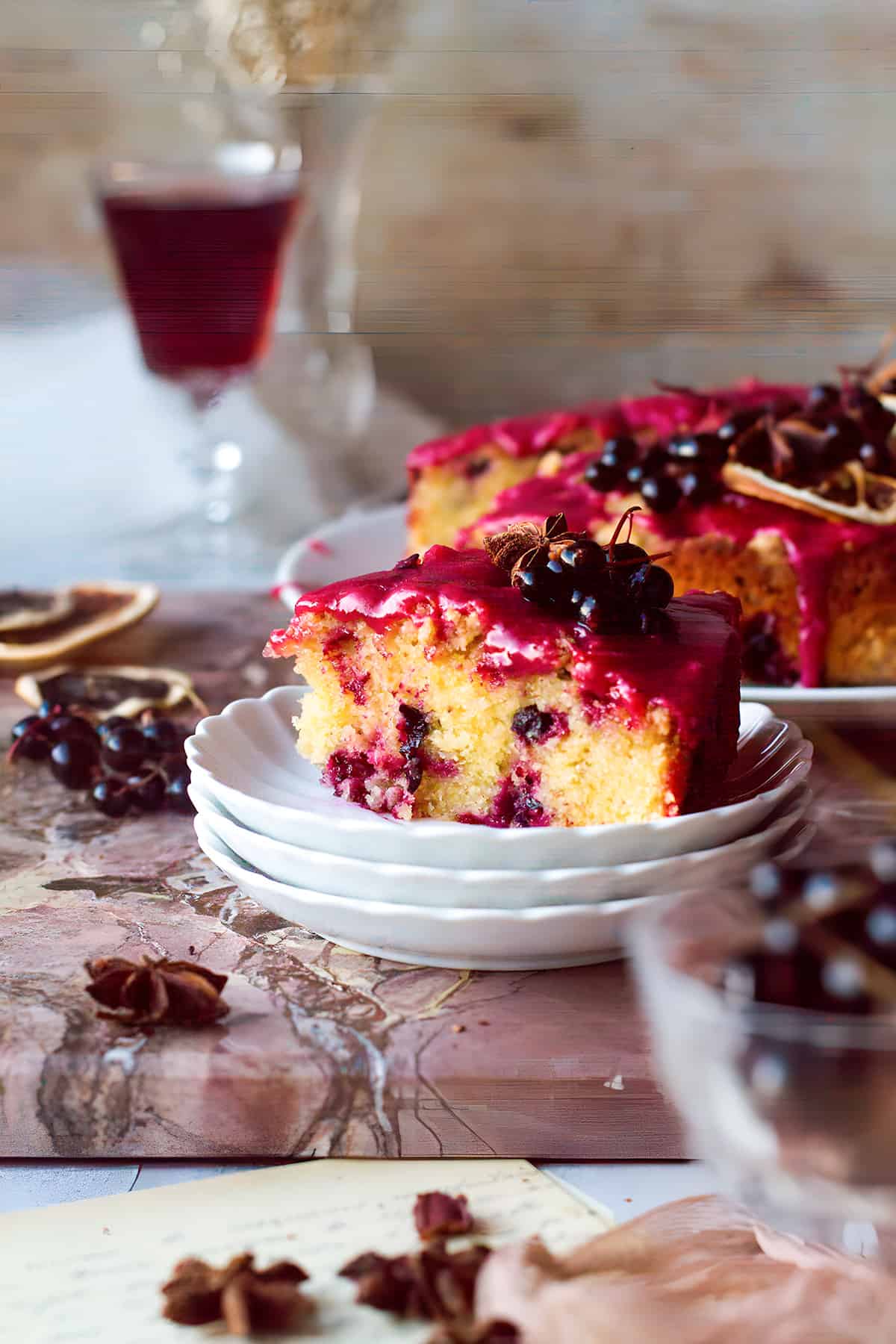 Close-up of a slice of blackcurrant coffee cake.