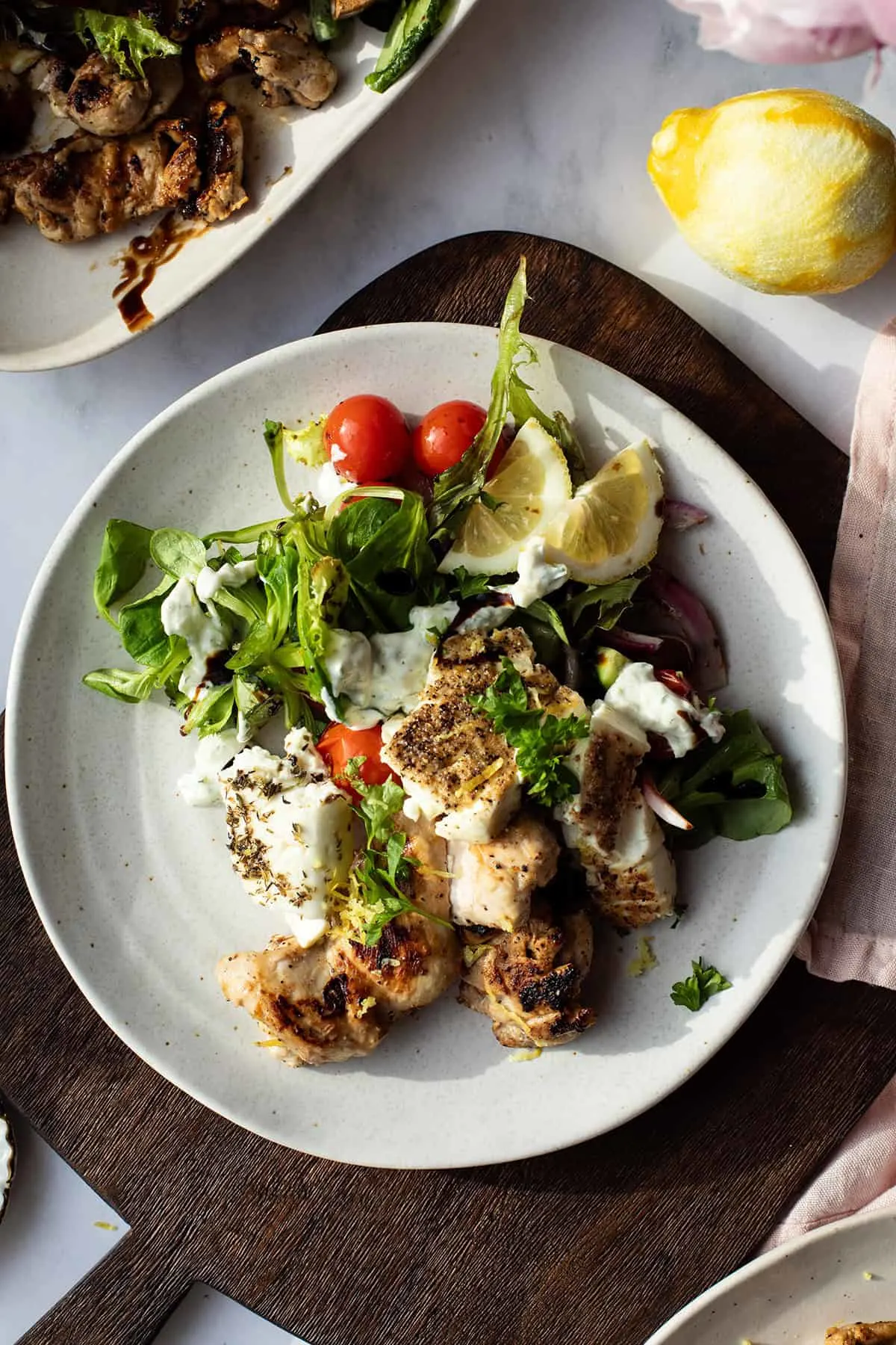 Serving suggestion with grilled chicken, salad and baked feta cheese.