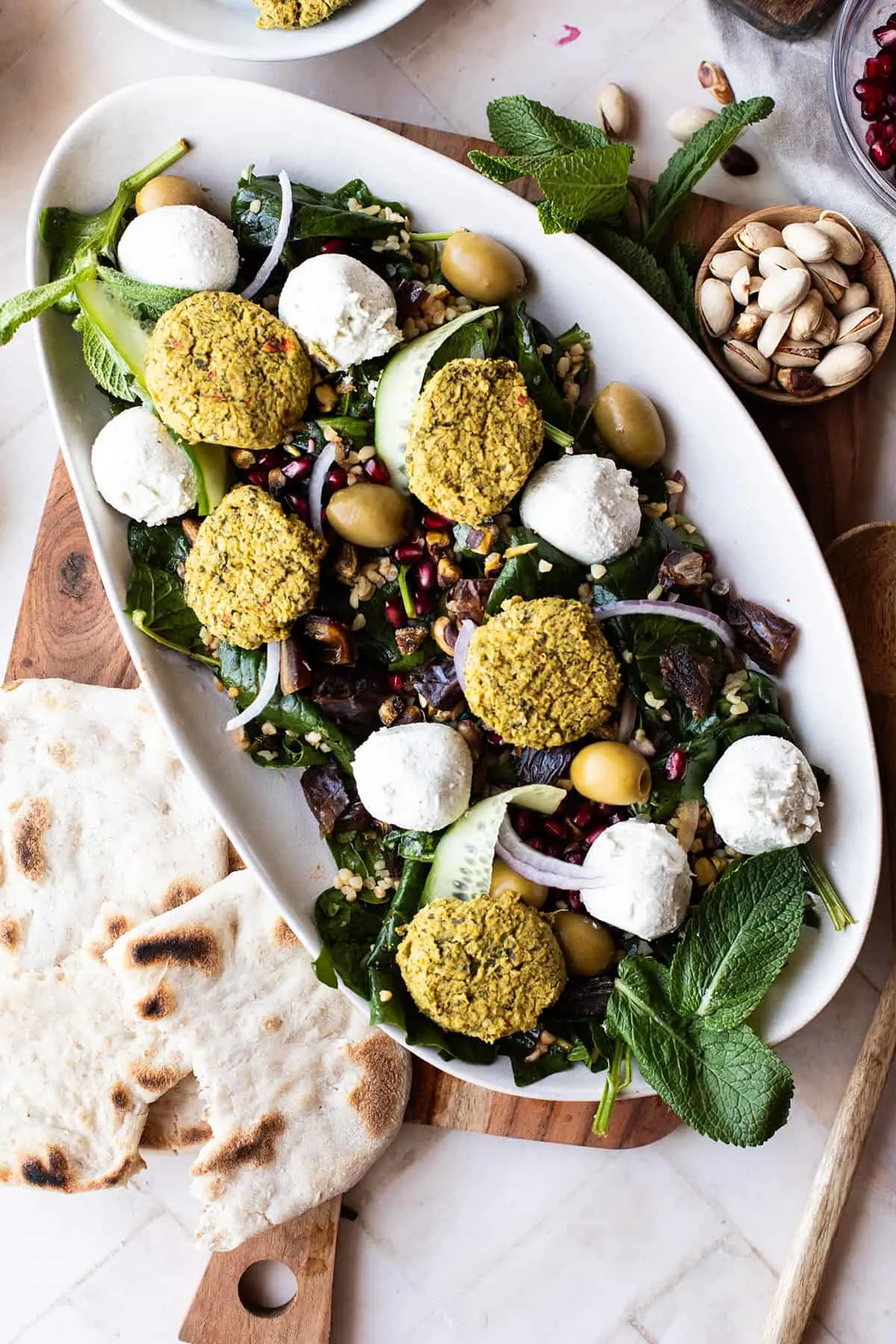 Close-up of the plate with bulgur falafel salad.