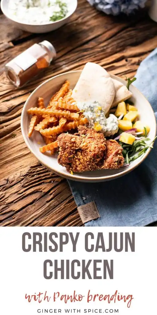 Pinterest pin with one photo of the crispy Cajun chicken, title text below.