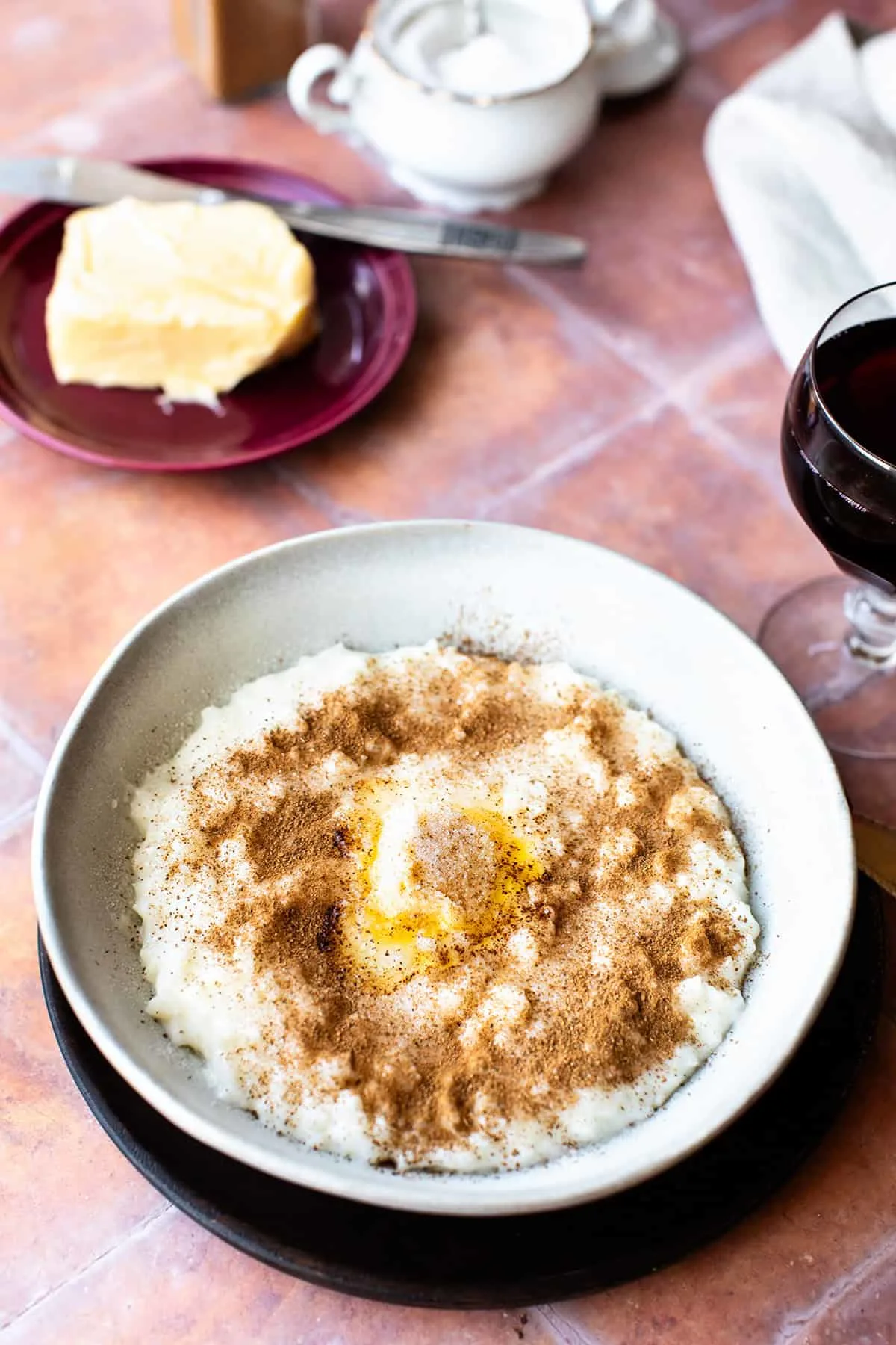 Close-up of the rice porridge with cinnamon and sugar on top.