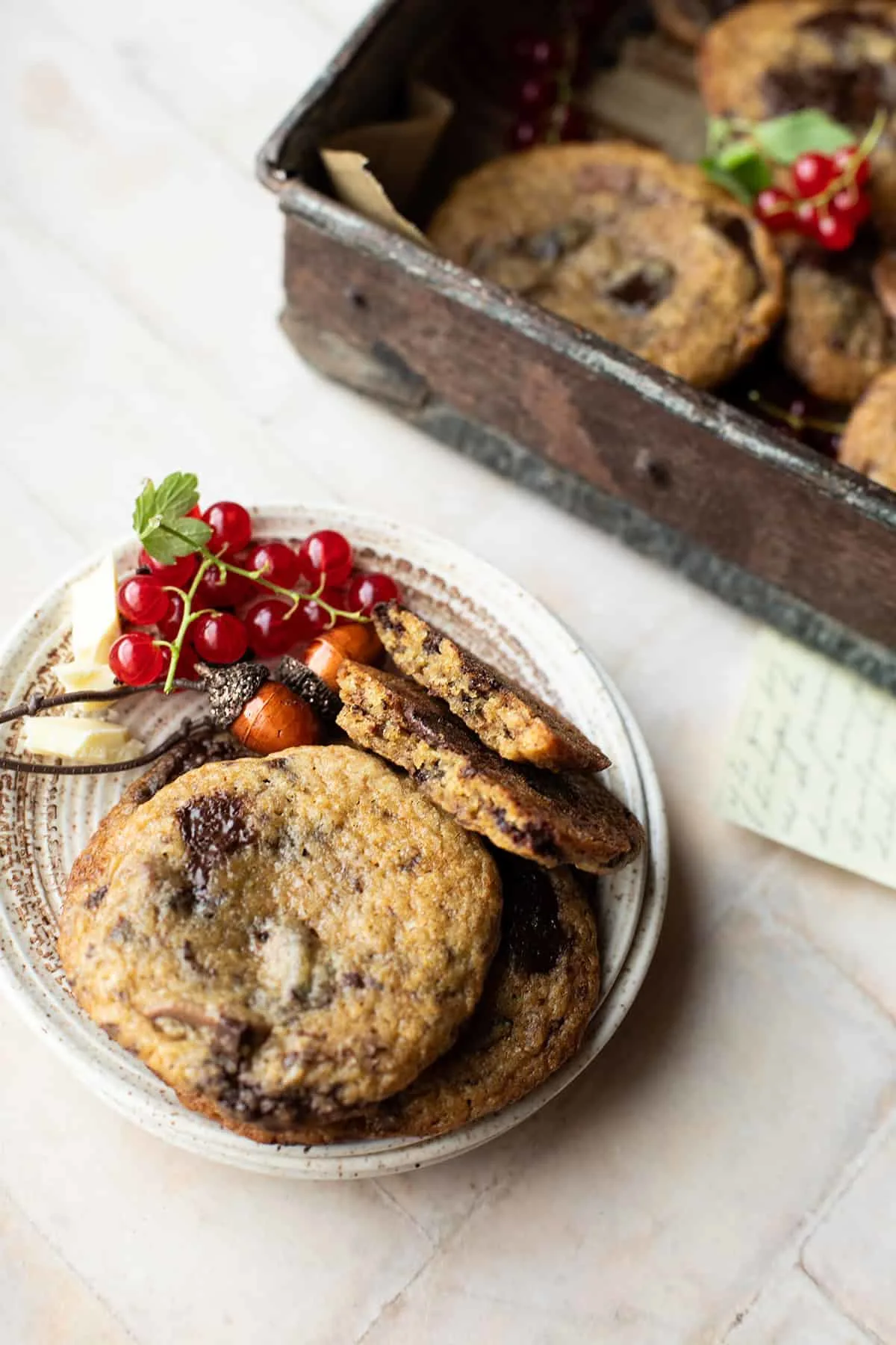 Dried berries cookies on a serving plate.