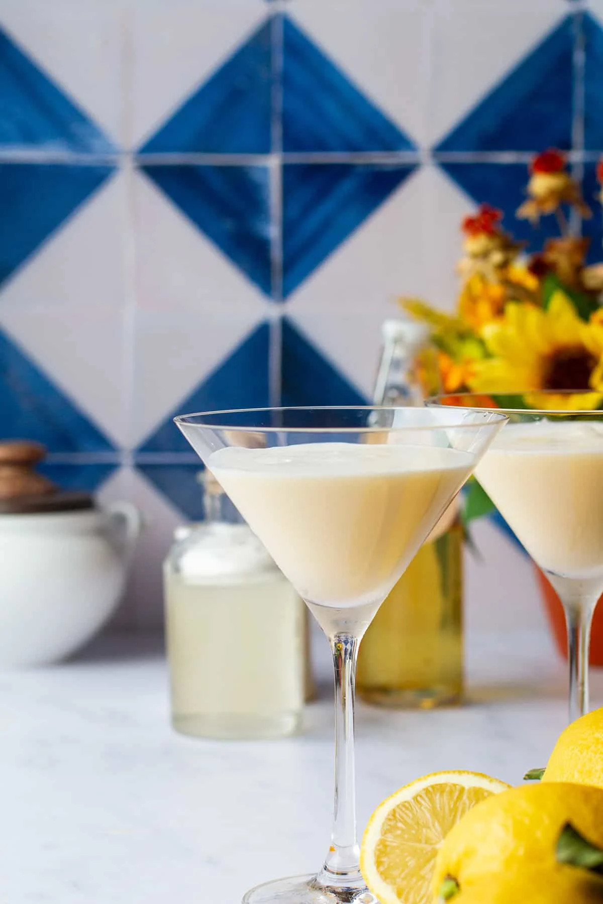 Creamy limoncello cocktail in a martini glass.