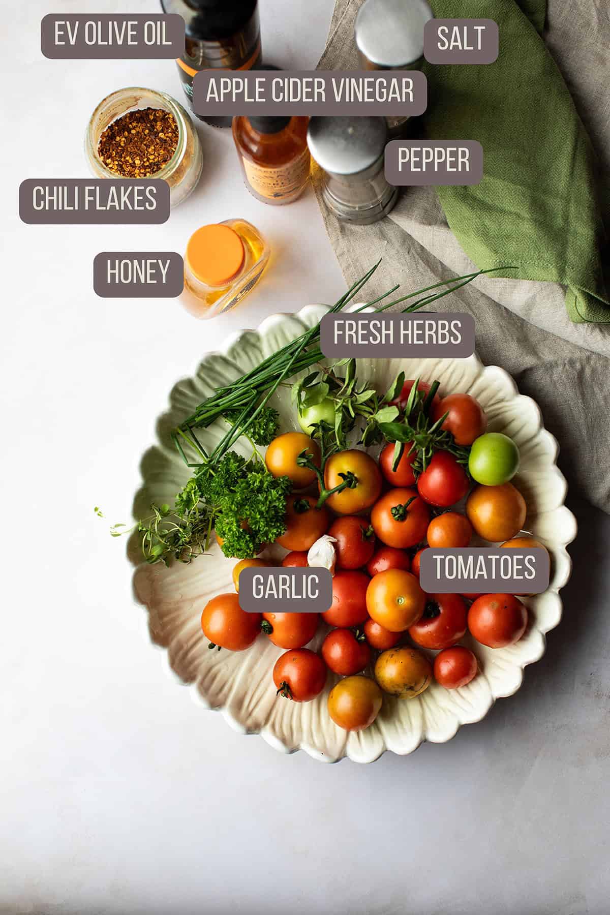 Ingredients to make marinated tomatoes.